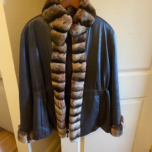 Leather jacket trimmed with Rabbit fur